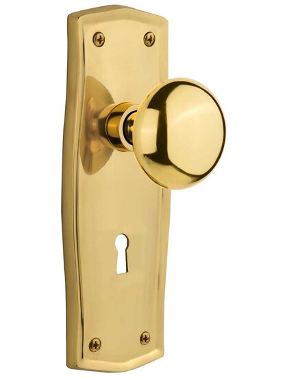 Prairie Design Mortise Lock Set With Round Brass Knobs in Un-Lacquered Brass.